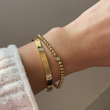 Golden Bead Bracelet with single stone