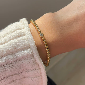 Golden Bead Bracelet with single stone